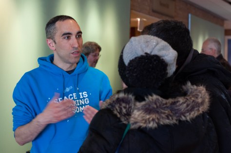 Talking to visitors about volunteer opportunities